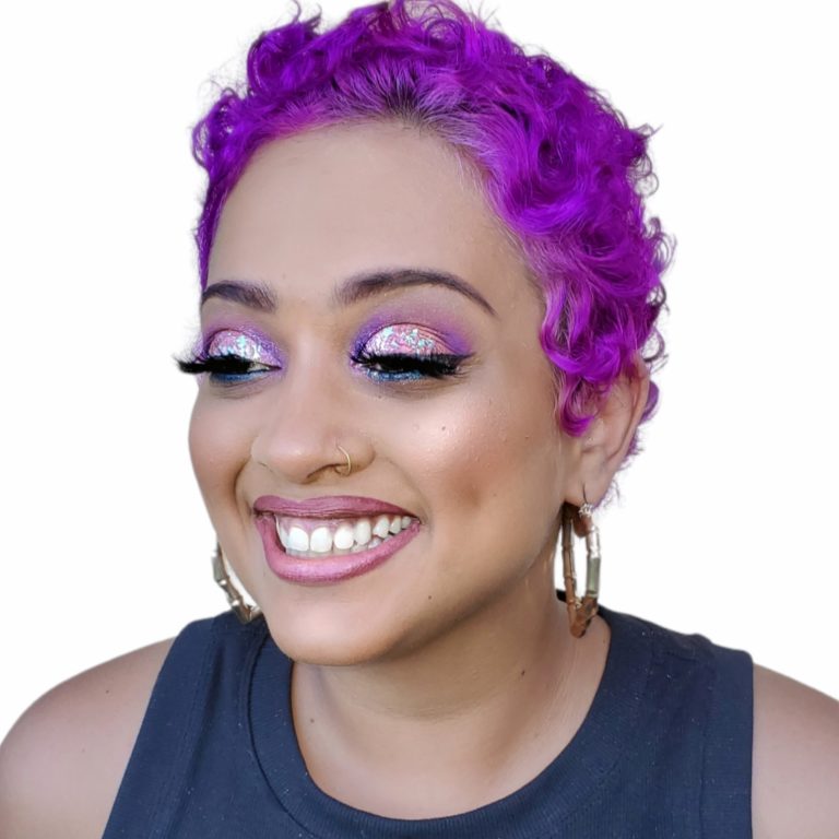 purple glitter eyeshadow on woman with brown skin tone